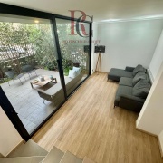 FANTÁSTICO DEPARTAMENTO TRIPLEX CON PATIO PRIVADO EN PROVIDENCIA 